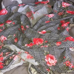 Rose wrapped shirt.